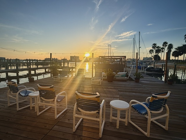 Sunrise seating on the deck at Barefoot Bay Marina